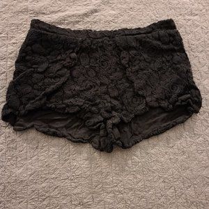 Black scalloped textured shorts